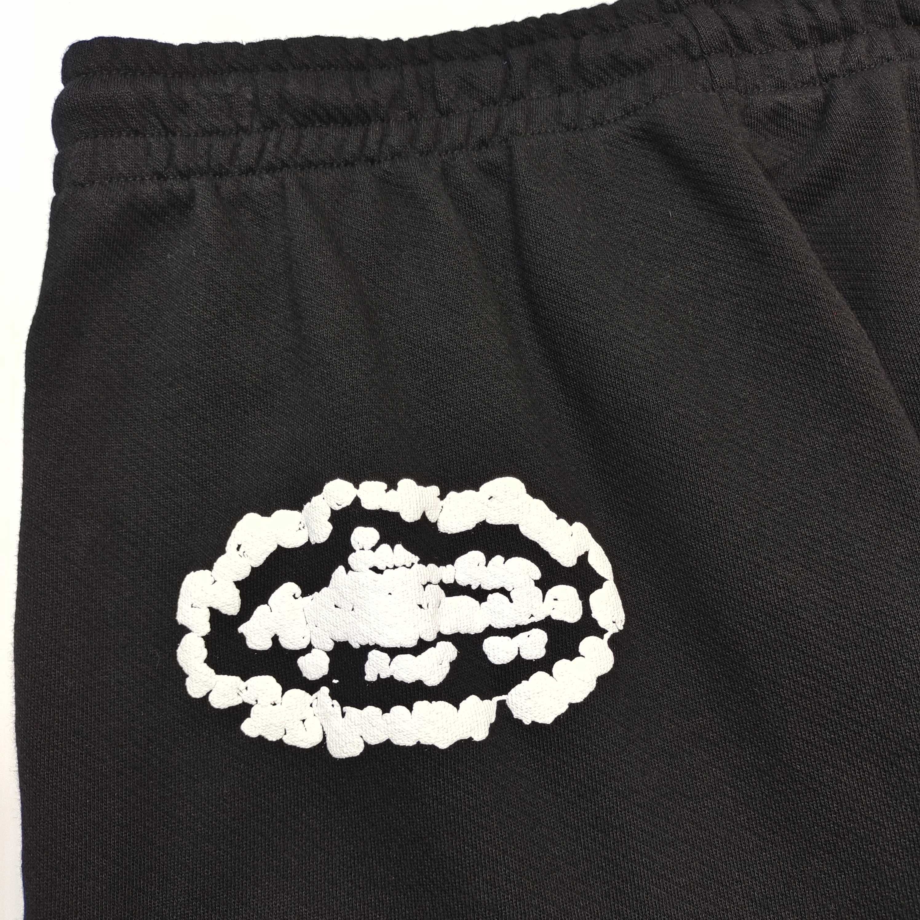 DENIM TEARS X CORTEIZ SWEATPANTS